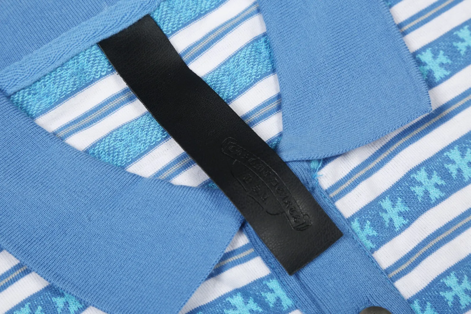 P210 White background picture [Popular item] Code: 25020# Color: Black/Pink/Blue Size: S to - CH Croix heart niche design cross jacquard striped long sleeves brings striped Polo to Next Levels. Loose fit. Same style for men and women. Lazy and casual. Street style. Three colors. Customized style.
